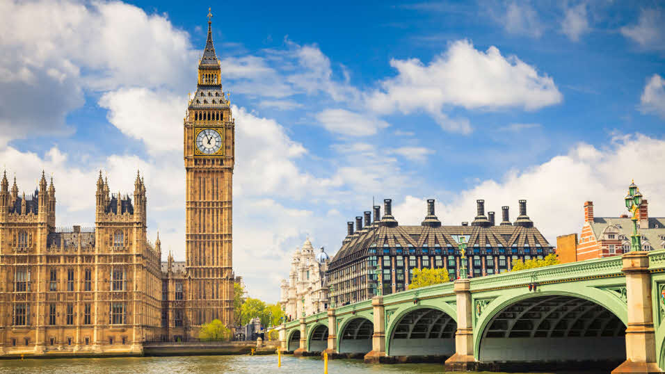 Big Ben Clock and Westminster Palace overlooking the Thames in London
