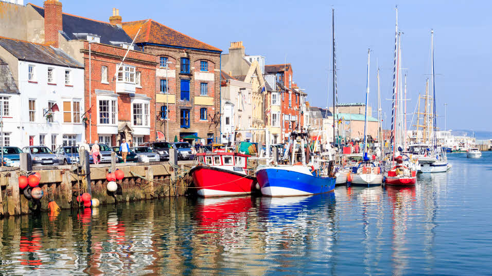 boats along Weymouth harbour in Dorset